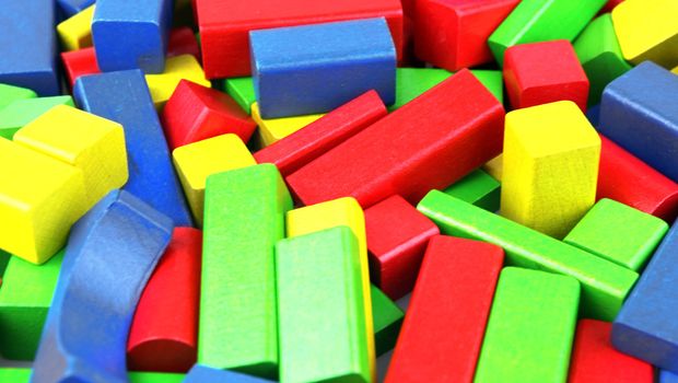 Wooden building blocks isolated on white background