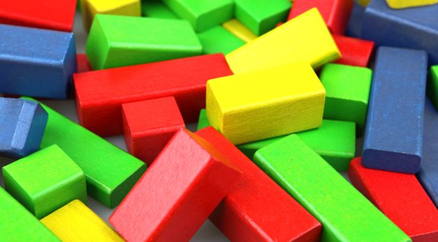 Wooden building blocks isolated on white background