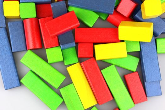 Wooden building blocks isolated on white background