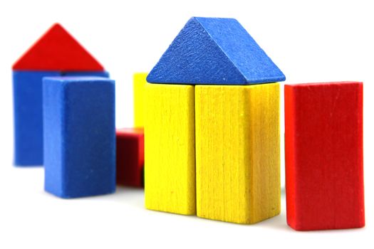 Wooden building blocks isolated on white background