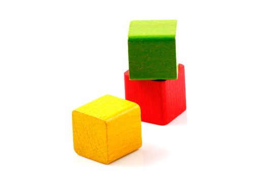 Wooden building blocks isolated on white background