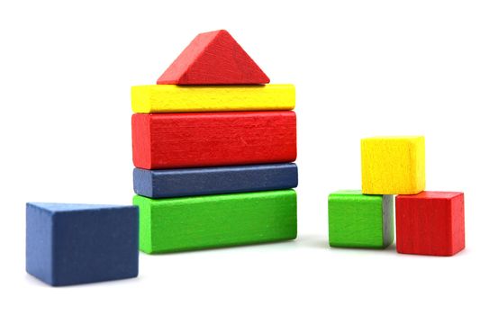 Wooden building blocks isolated on white background