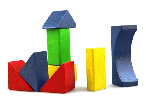 Wooden building blocks isolated on white background