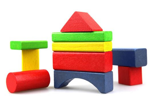 Wooden building blocks isolated on white background