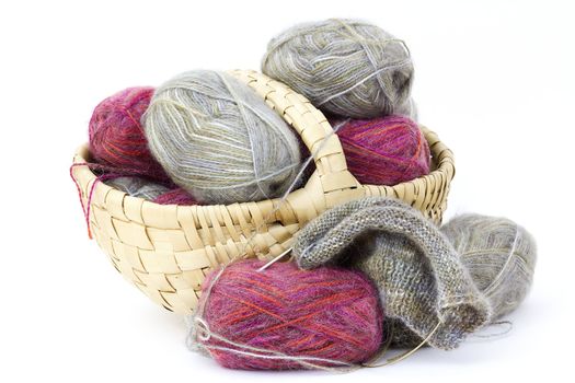 Woollen thread and knitting needle. Needlework accessories isolated on white background.