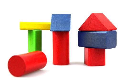 Wooden building blocks isolated on white background