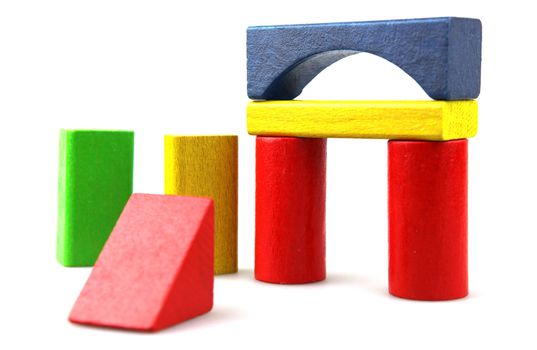 Wooden building blocks isolated on white background