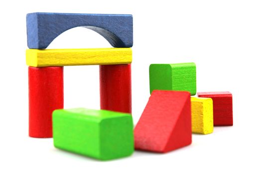 Wooden building blocks isolated on white background
