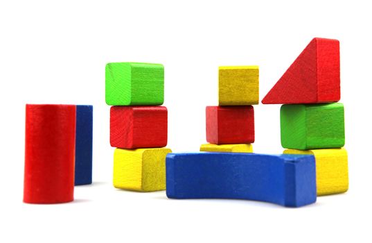 Wooden building blocks isolated on white background