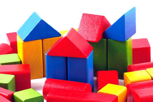 Wooden building blocks isolated on white background