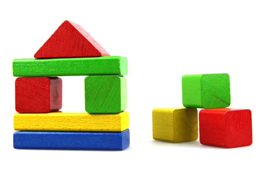 Wooden building blocks isolated on white background