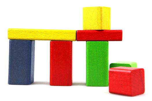 Wooden building blocks isolated on white background
