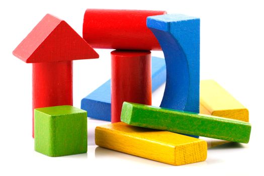 Wooden building blocks isolated on white background