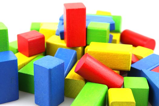 Wooden building blocks isolated on white background