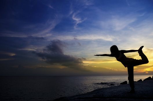 Silhouette of Woman Practicing Yoga