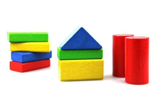 Wooden building blocks isolated on white background
