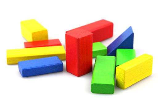 Wooden building blocks isolated on white background