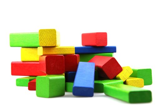 Wooden building blocks isolated on white background