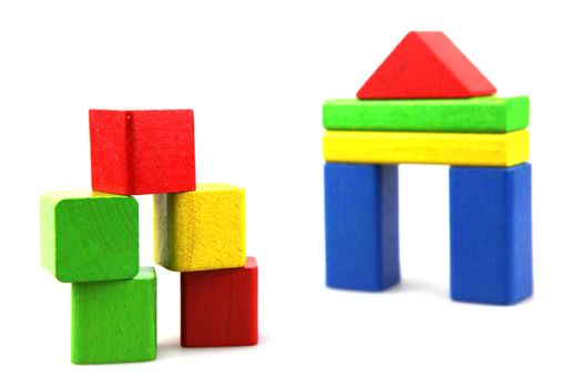 Wooden building blocks isolated on white background