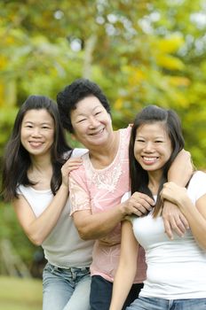 Happy Asian Senior lady and her daughters