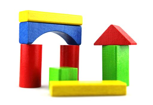 Wooden building blocks isolated on white background