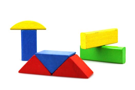 Wooden building blocks isolated on white background