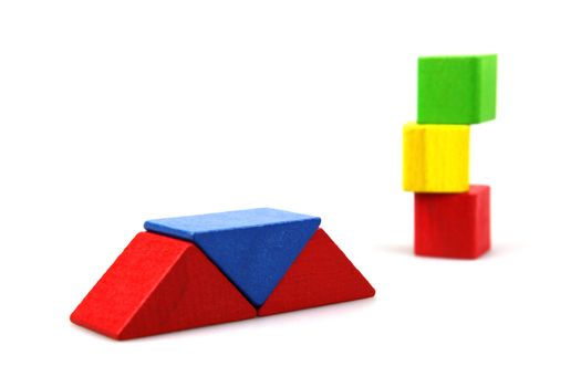 Wooden building blocks isolated on white background