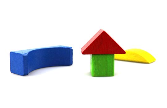 Wooden building blocks isolated on white background