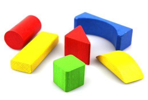 Wooden building blocks isolated on white background