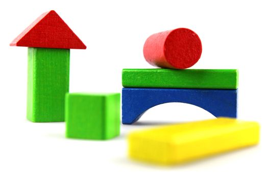 Wooden building blocks isolated on white background