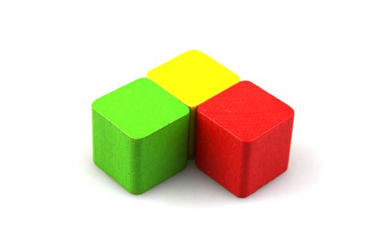 Wooden building blocks isolated on white background