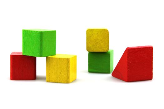 Wooden building blocks isolated on white background
