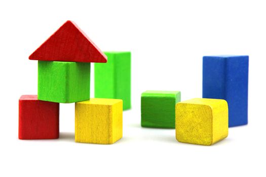 Wooden building blocks isolated on white background