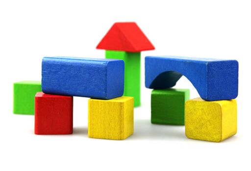 Wooden building blocks isolated on white background