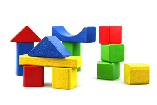 Wooden building blocks isolated on white background