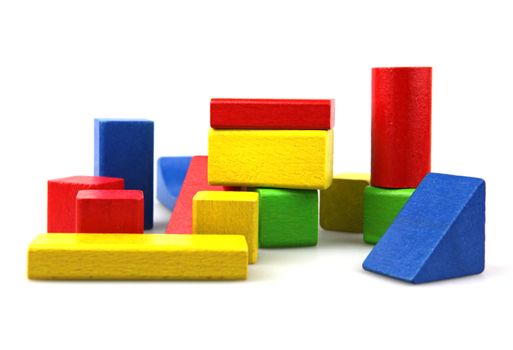 Wooden building blocks isolated on white background