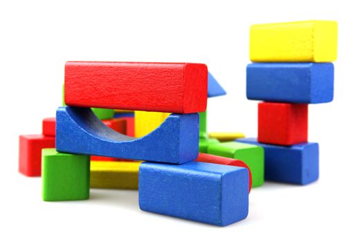 Wooden building blocks isolated on white background