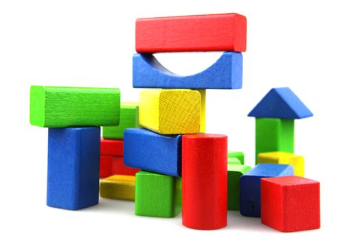 Wooden building blocks isolated on white background