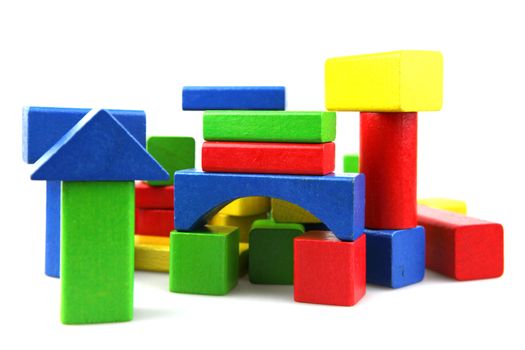 Wooden building blocks isolated on white background
