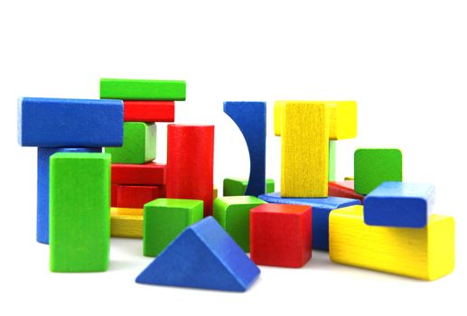 Wooden building blocks isolated on white background