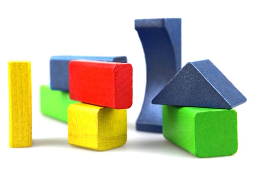 Wooden building blocks isolated on white background