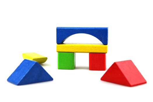 Wooden building blocks isolated on white background