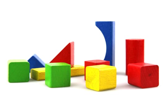 Wooden building blocks isolated on white background