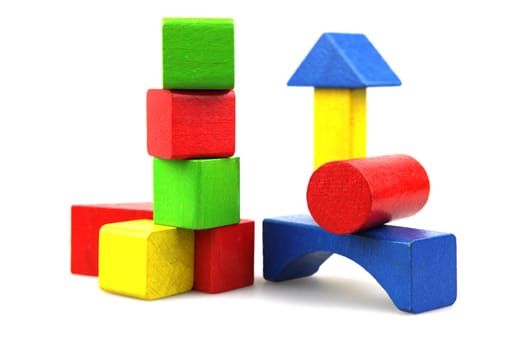 Wooden building blocks isolated on white background