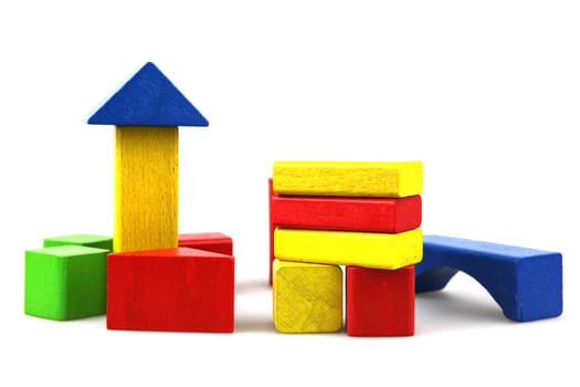 Wooden building blocks isolated on white background