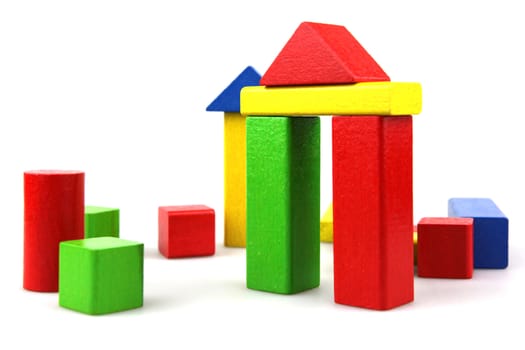 Wooden building blocks isolated on white background