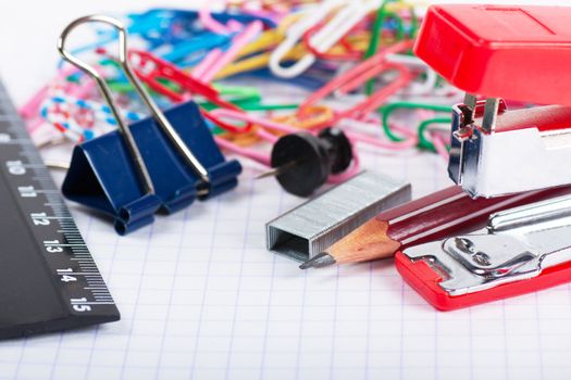 Closeup view of different stationary tools on a paper