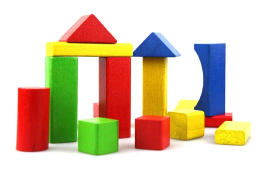 Wooden building blocks isolated on white background
