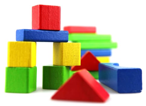 Wooden building blocks isolated on white background