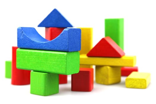 Wooden building blocks isolated on white background